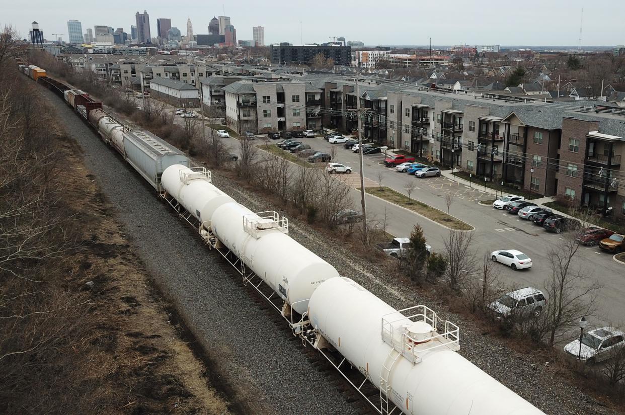 Freight trains that could be carrying hazardous materials run alongside an apartment complex on the North Side. This is within a few feet of where a a derailed freight train caught fire in 2012, prompting the evacuation of a mile-wide area.