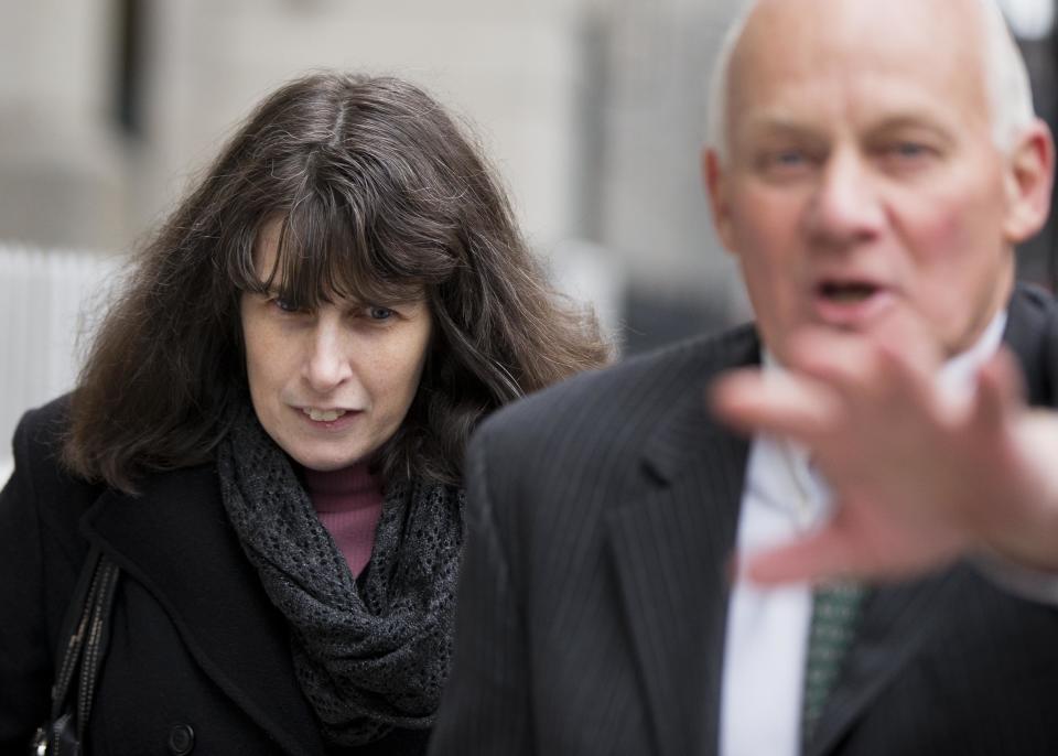 Catherine Schaible walks from the criminal justice center Wednesday, Feb. 19, 2014, in Philadelphia. Herbert and Catherine Schaible who believed in faith-healing were sentenced Wednesday to 3.5 to seven years in prison in the death of a second child who was sick but didn't see a doctor. Philadelphia Common Pleas Judge Benjamin Lerner told Herbert and Catherine Schaible that it wasn't 8-month-old Brandon's time to die.(AP Photo/Matt Rourke)