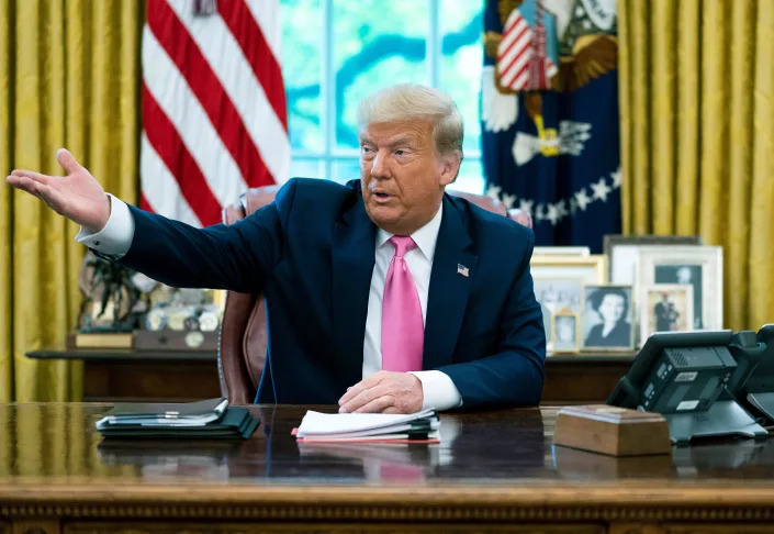 President Donald Trump talks to reporters while hosting Republican Congressional leaders and members of his cabinet in the Oval Office at the White House July 20, 2020 in Washington, DC.