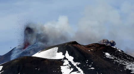 FILE PHOTO Italy's Mount Etna, Europe's tallest and most active volcano, spews lava as it erupts on the southern island of Sicily, Italy February 28, 2017. REUTERS/Antonio Parrinello/File photo