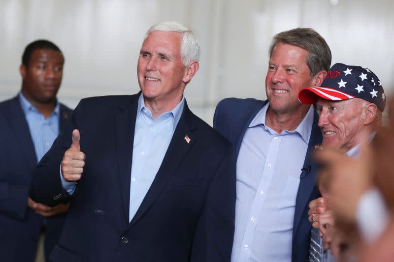 Former Vice President Mike Pence and Georgia Governor Brian Kemp attend a rally ahead of the state's Republican primary in Kennesaw