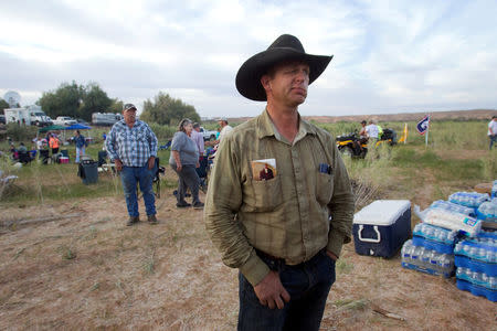 FILE PHOTO: Ryan Bundy (R), a son of rancher Cliven Bundy, attends a Bundy family "Patriot Party" near Bunkerville, Nevada, April 18, 2014. REUTERS/Steve Marcus/File Photo