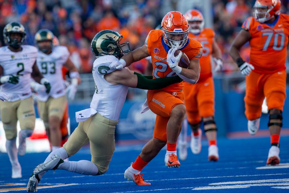 Oct 29, 2022; Boise, Idaho, USA; Boise State Broncos running back George Holani (24) runs with the ball during the first half against the Colorado State Rams at Albertsons Stadium. Mandatory Credit: Brian Losness-USA TODAY Sports
