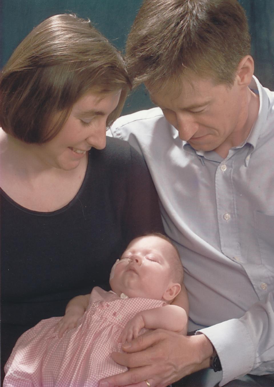 Anne and Graeme Dixon with baby Elizabeth aged eight-and-a-half months (Dixon family/PA)