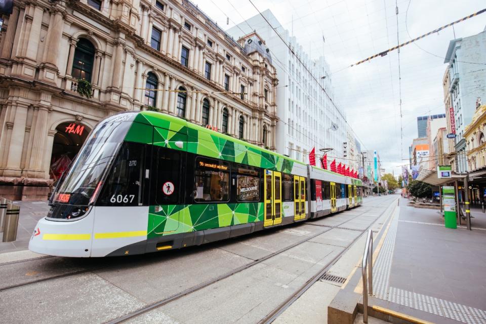 Melbourne tram passing through city