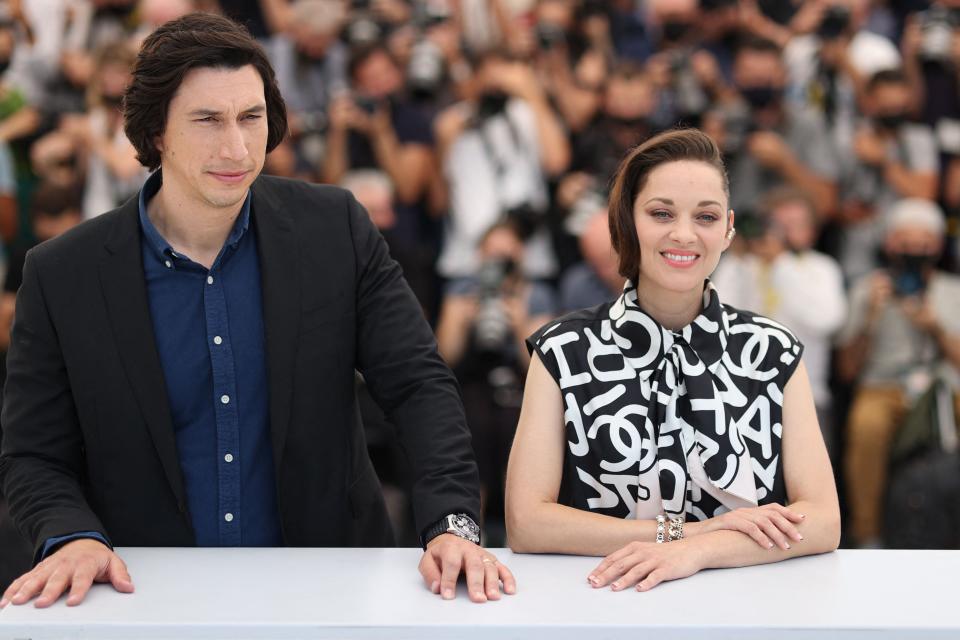 Adam Driver and Marion Cotillard during a photocall for the film "Annette" at the 74th edition of the Cannes Film Festival. The photocall, which precedes an afternoon press conference with the actors, is another vaunted Cannes tradition.