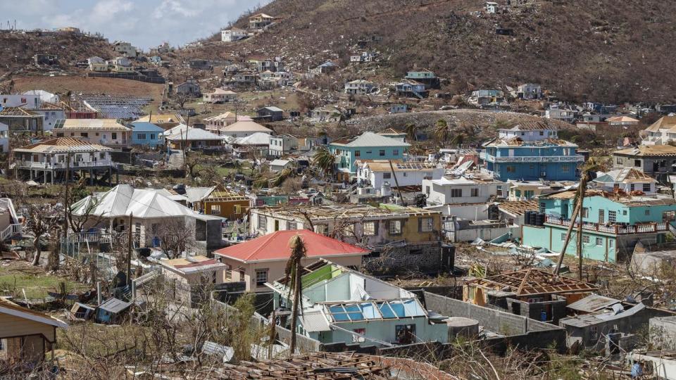 Homes destroyed by Hurricane Beryl lie in Clifton, Union Island