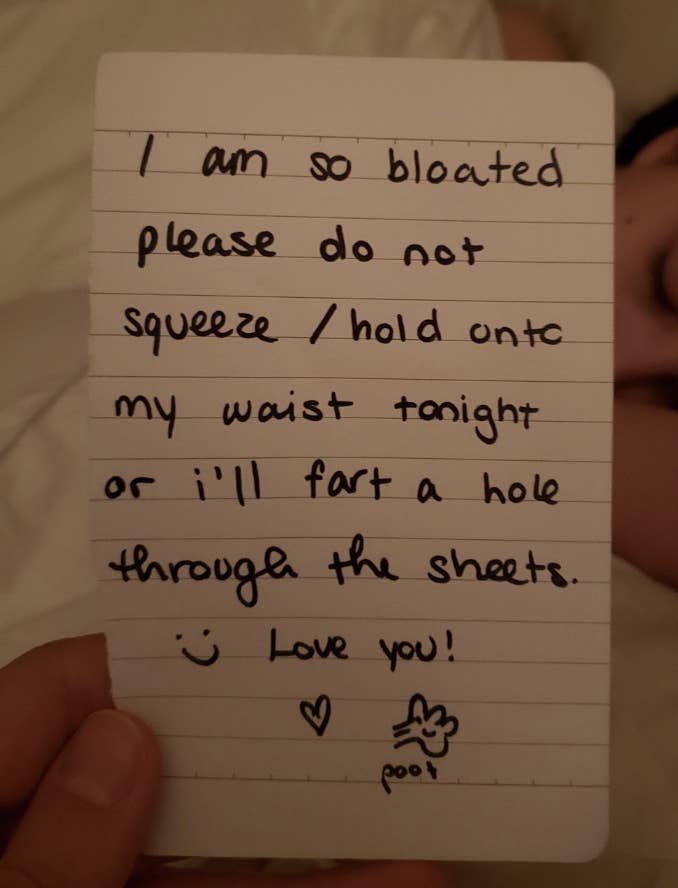 The note says "I am so bloated, please do not squeeze or hold on to my waist tonight or I'll fart a hole through the sheets"