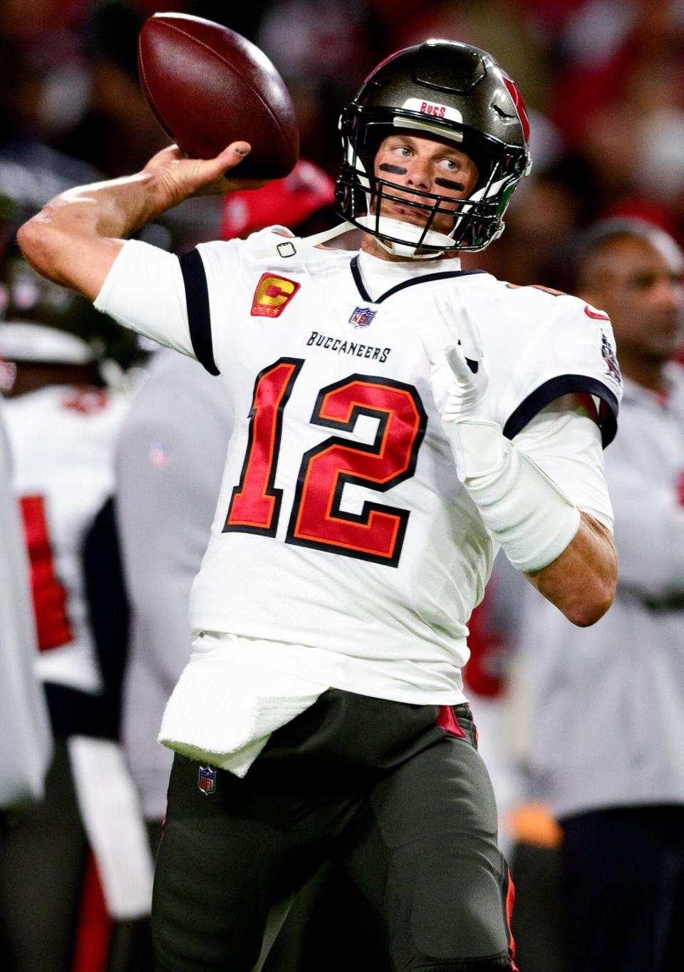 Tom Brady #12 of the Tampa Bay Buccaneers warms up prior to a game against the Dallas Cowboys in the NFC Wild Card playoff game