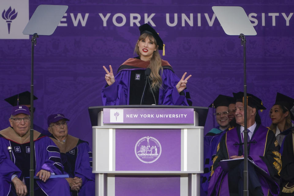 Taylor Swift speaks during a graduation ceremony for New York University at Yankee Stadium in New York, Wednesday, May 18, 2022. (AP Photo/Seth Wenig)