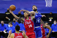 Philadelphia 76ers' Danny Green, center, and Los Angeles Lakers' Marc Gasol, right, reach for a rebound during the first half of an NBA basketball game, Wednesday, Jan. 27, 2021, in Philadelphia. (AP Photo/Matt Slocum)