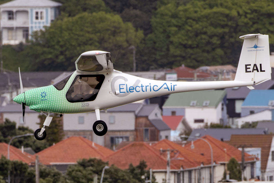 The ElectricAir plane is on approach before landing at Wellington Airport in Wellington, New Zealand, Monday, Nov. 1, 2021. Seeking to highlight the potential for green aviation as a pivotal climate change conference opened in Glasgow, New Zealand pilot Gary Freedman made the first-ever flight over Cook Strait in an electric plane. (Mark Mitchell/New Zealand Herald via AP)