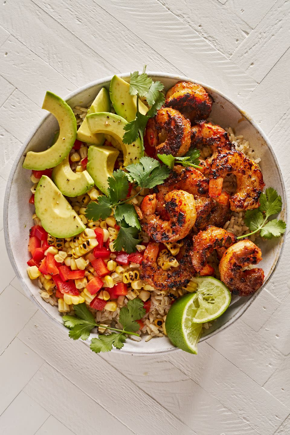 <p>Extra-flavorful <a href="https://www.delish.com/cooking/recipe-ideas/g2768/shrimp-recipes/" rel="nofollow noopener" target="_blank" data-ylk="slk:shrimp;elm:context_link;itc:0;sec:content-canvas" class="link ">shrimp</a>, whole grains, fresh veg... these bowls have got you covered. Feel free to swap your favorite <a href="https://www.delish.com/cooking/recipe-ideas/g2843/easy-salsa-recipes/" rel="nofollow noopener" target="_blank" data-ylk="slk:salsa;elm:context_link;itc:0;sec:content-canvas" class="link ">salsa</a> in lieu of the corn and tomato mix here (<a href="https://www.delish.com/cooking/recipe-ideas/a53100/cowboy-caviar-recipe/" rel="nofollow noopener" target="_blank" data-ylk="slk:cowboy caviar;elm:context_link;itc:0;sec:content-canvas" class="link ">cowboy caviar</a> would be GREAT).</p><p>Get the <strong><a href="https://www.delish.com/cooking/recipe-ideas/a19624080/blackened-shrimp-bowls-recipe/" rel="nofollow noopener" target="_blank" data-ylk="slk:Blackened Shrimp Bowls recipe;elm:context_link;itc:0;sec:content-canvas" class="link ">Blackened Shrimp Bowls recipe</a></strong>.</p>