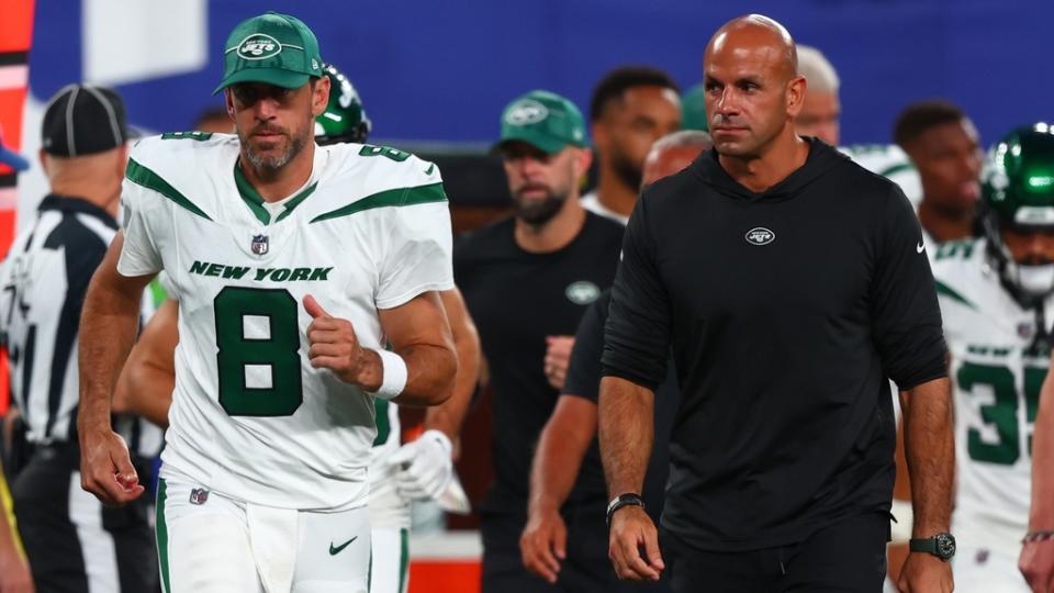 Aug 26, 2023; East Rutherford, New Jersey, USA; New York Jets quarterback Aaron Rodgers (8) and head coach Robert Saleh leave the field after the first half of their game against the New York Giants at MetLife Stadium.