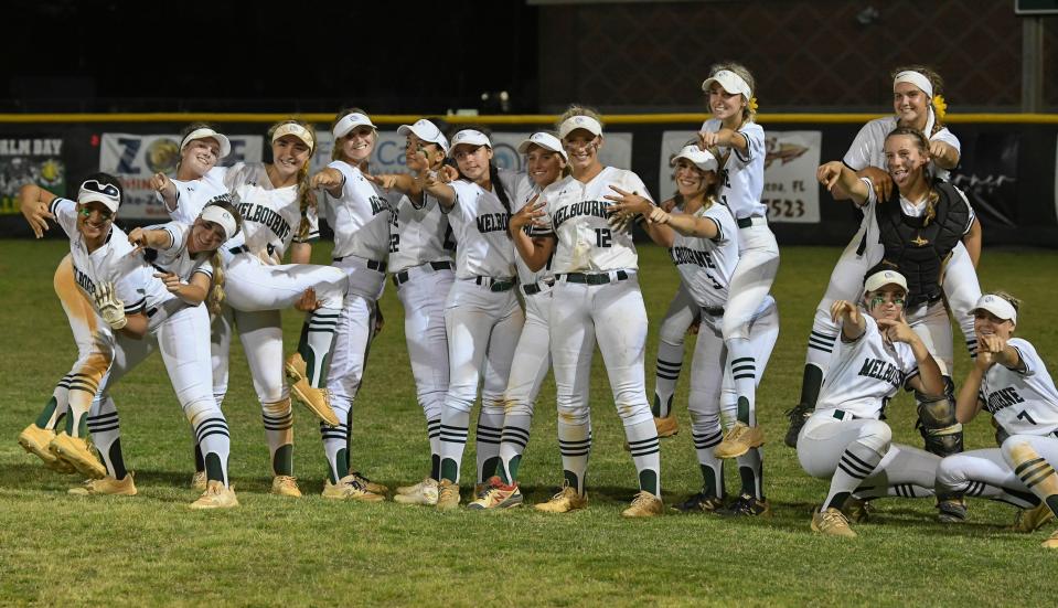 Melbourneâ€™s softball team poses for pictures after their game against Hagerty April 13, 2022. Craig Bailey/FLORIDA TODAY via USA TODAY NETWORK