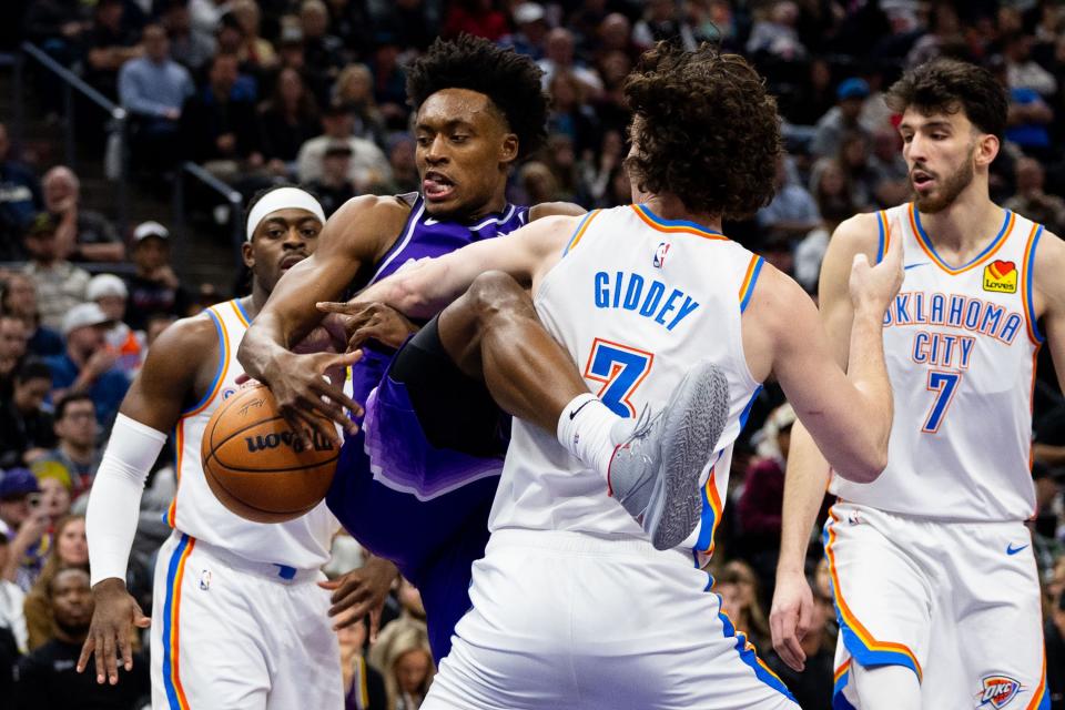 Utah Jazz guard Collin Sexton (2) gets caught up by Oklahoma City Thunder guard Josh Giddey (3) on defense during an NBA basketball game between the Utah Jazz and the Oklahoma City Thunder at the Delta Center in Salt Lake City on Tuesday, Feb. 6, 2024. | Megan Nielsen, Deseret News