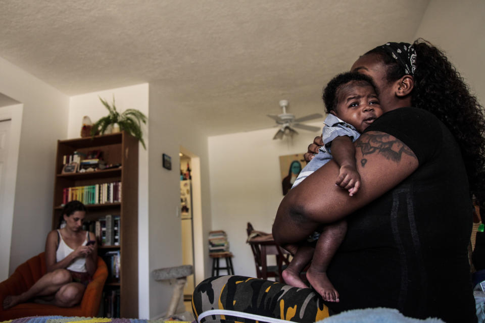 Natandra Lewis her newborn Chandler escaped Hurricane Dorians storm surge and are lucky to have clean water and restful nights in West Palm Beach after arriving from Freeport, Grand Bahama Wednesday morning, Sept. 18, 2019. (Photo: Maria Alejandra Cardona for HuffPost)