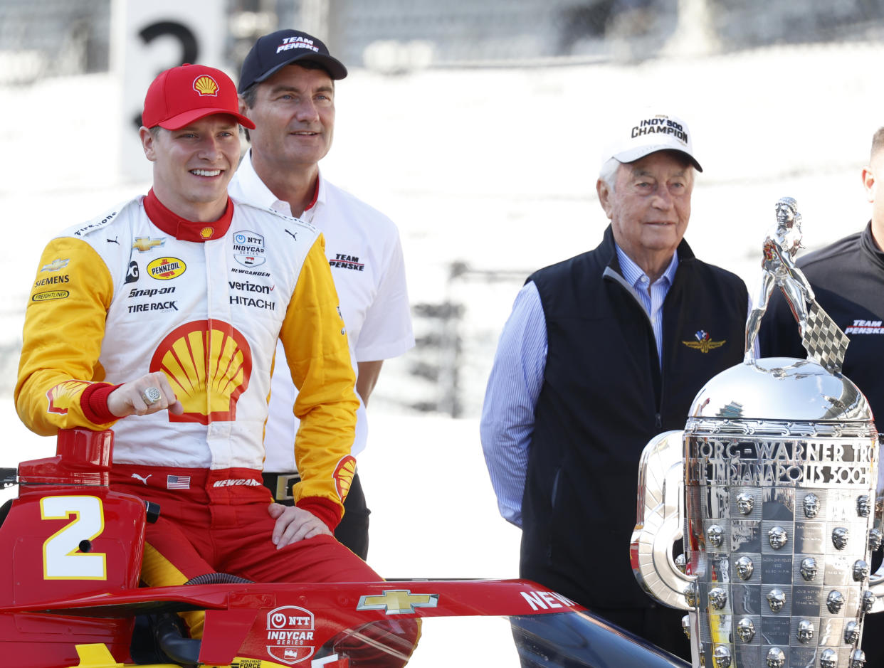 INDIANAPOLIS, IN - MAY 29: NTT IndyCar series driver Josef Newgarden poses for a photo with car owner Roger Penske and team president Tim Cindric on May 29, 2023, after winning the 107th running of the Indianapolis 500 at the Indianapolis Motor Speedway in Indianapolis Motor Speedway. (Photo by Brian Spurlock/Icon Sportswire via Getty Images)