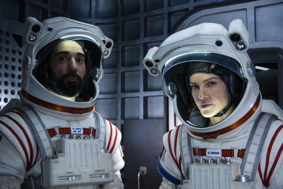 AWAY (L to R) RAY PANTHAKI as RAM ARYA and HILARY SWANK as EMMA GREEN, in episode 109 of AWAY. (DIYAH PERA/NETFLIX © 2020)