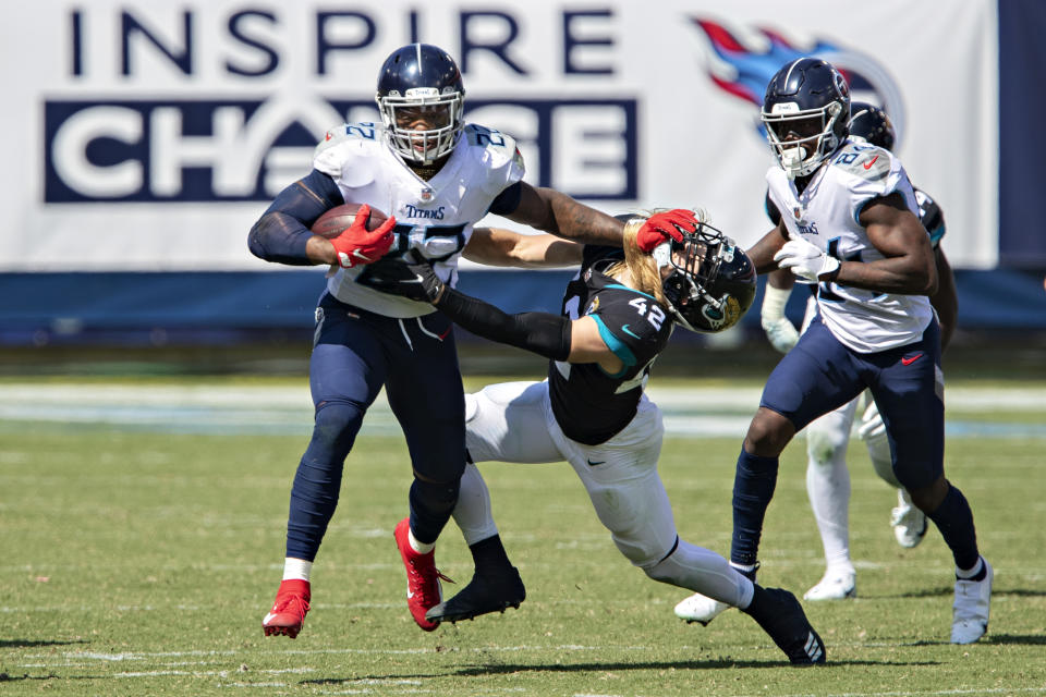 Derrick Henry's stiff arm is already the stuff of legend. (Photo by Wesley Hitt/Getty Images)