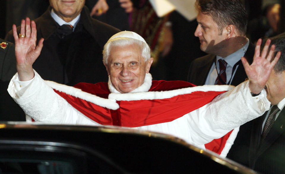 FILE - Pope Benedict XVI waves after arriving at Istanbul's airport, Turkey, on Nov. 29, 2006. When Cardinal Joseph Ratzinger became Pope Benedict XVI and was thrust into the footsteps of his beloved and charismatic predecessor, he said he felt a guillotine had come down on him. The Vatican announced Saturday Dec. 31, 2022 that Benedict, the former Joseph Ratzinger, had died at age 95. (AP Photo/Andrew Medichini, File)