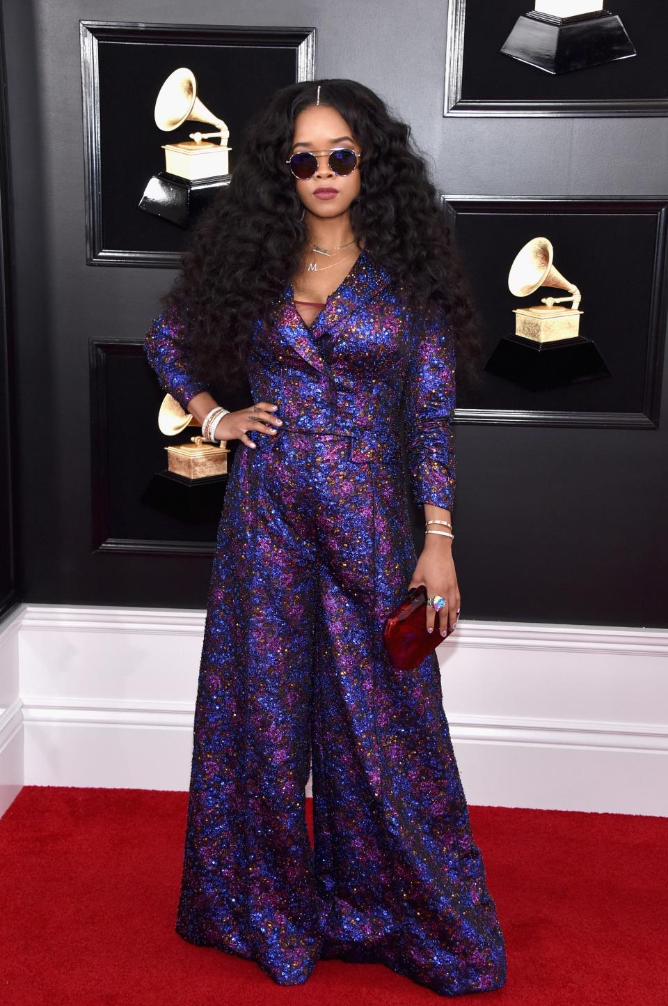 H.E.R. in Coach and Judith Leiber Couture bag