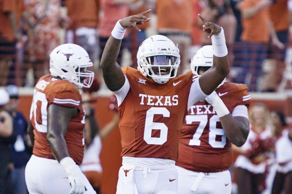 Oct 28, 2023; Austin, Texas, USA; Texas Longhorns quarterback Maalik Murphy (6) reacts after throwing a touchdown pass during the first half against the Brigham Young Cougars at Darrell K Royal-Texas Memorial Stadium. Mandatory Credit: Scott Wachter-USA TODAY Sports