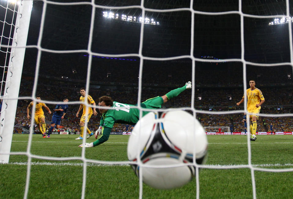 DONETSK, UKRAINE - JUNE 15: Jeremy Menez (2nd L) of France scores past Andriy Pyatov of Ukraine during the UEFA EURO 2012 group D match between Ukraine and France at Donbass Arena on June 15, 2012 in Donetsk, Ukraine. (Photo by Julian Finney/Getty Images)