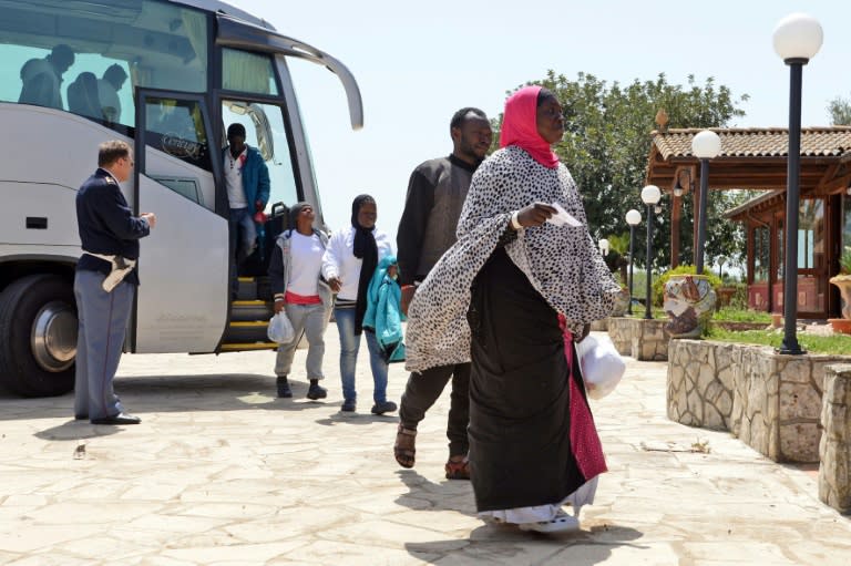 Migrants arrive at the Oasi Don Bosco immigration center in Sicily