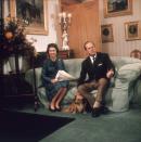 <p>Over in Balmoral, this image shows the Queen and Prince Philip looking relaxed on the sofa in the living room. The Queen is flicking through the newspaper while Philip is stroking their Corgi.</p>