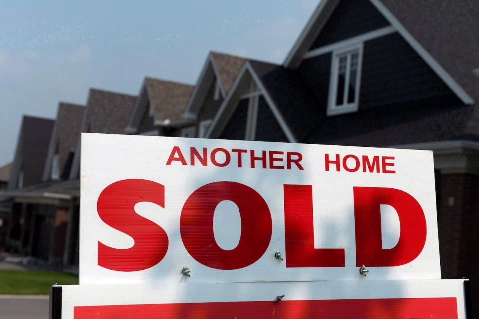 Buyers or their agents should request explicit confirmation that vacant unit tax declarations have been filed and any tax owing paid, says one real estate lawyer.   (Sean Kilpatrick/The Canadian Press - image credit)