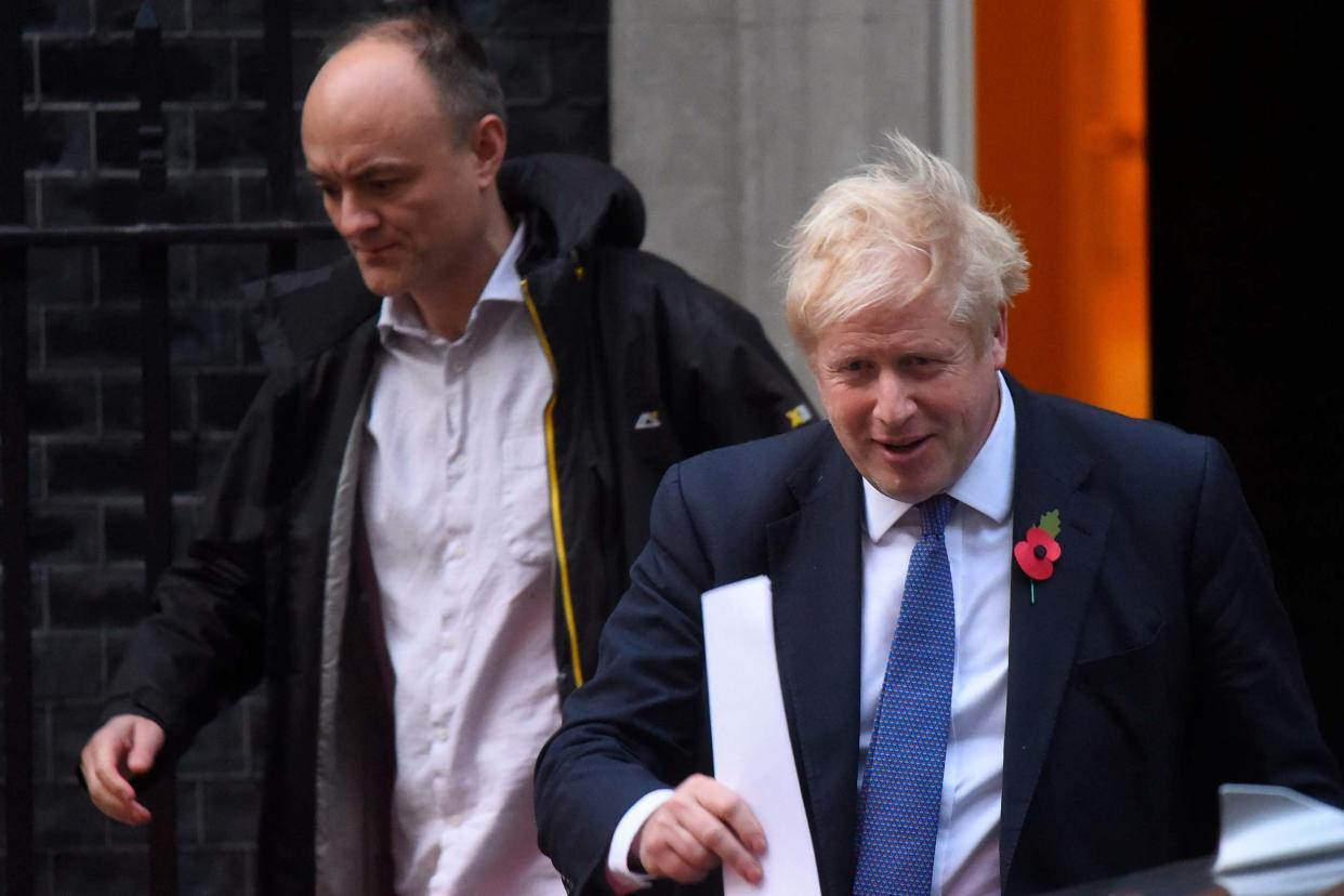 Political advisor Dominic Cummings leaves 10 Downing Street with Boris Johnson: Getty Images