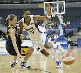 Anna DeForge, shown here playing defense, was in the WNBA for eight seasons.