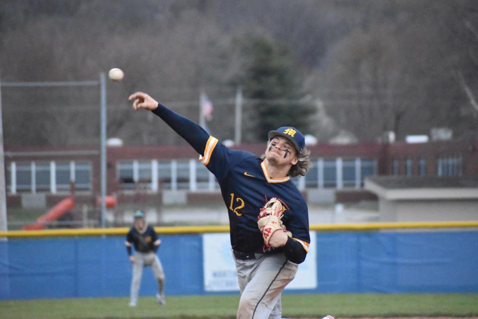 Mooresville's Hogan Denny finishes rivalry matchup with Martinsville on the mound on April 7, 2022.