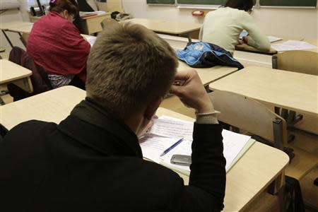 Russian speaking people learn Latvian in Daugavpils March 21, 2014. REUTERS/Ints Kalnins