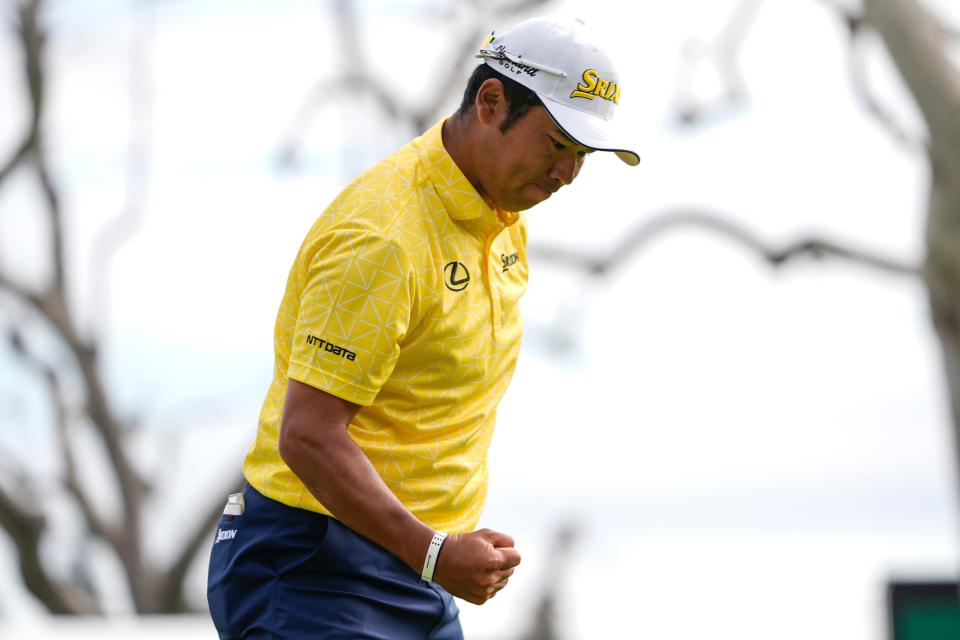 Hideki Matsuyama, of Japan, celebrates his shot on the 18th green during the final round of the Genesis Invitational golf tournament at Riviera Country Club, Sunday, Feb. 18, 2024, in the Pacific Palisades area of, Los Angeles. (AP Photo/Ryan Sun)