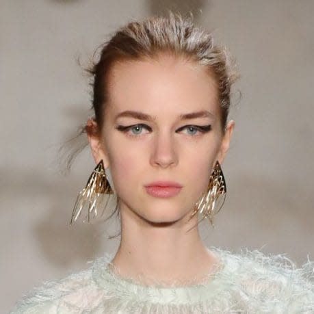 Messy buns reigned supreme at Jil Sander - Credit: Andreas Rentz/Getty Images Europe