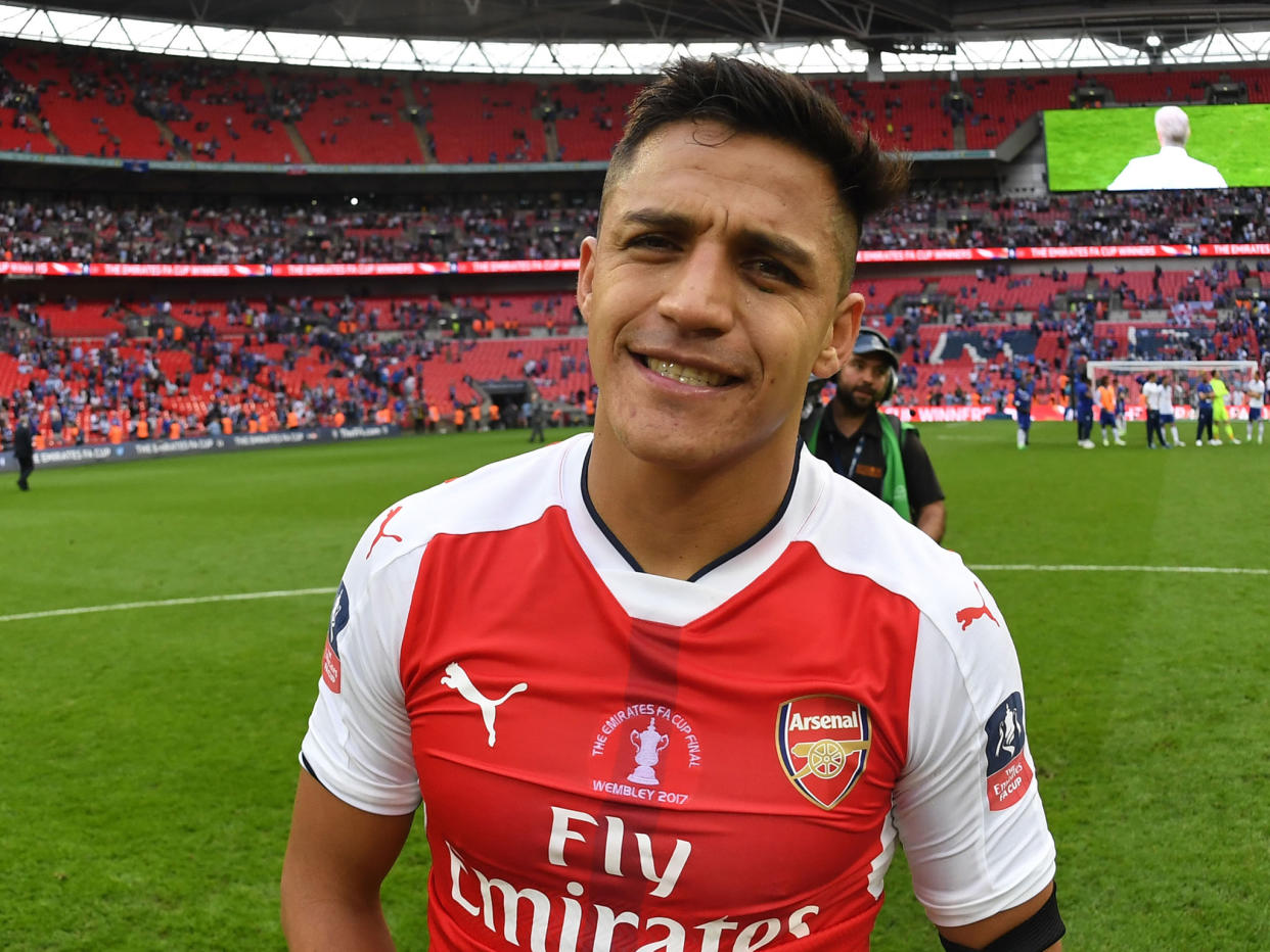 Alexis Sanchez's future at Arsenal is in the balance, with Manchester City interested: Getty