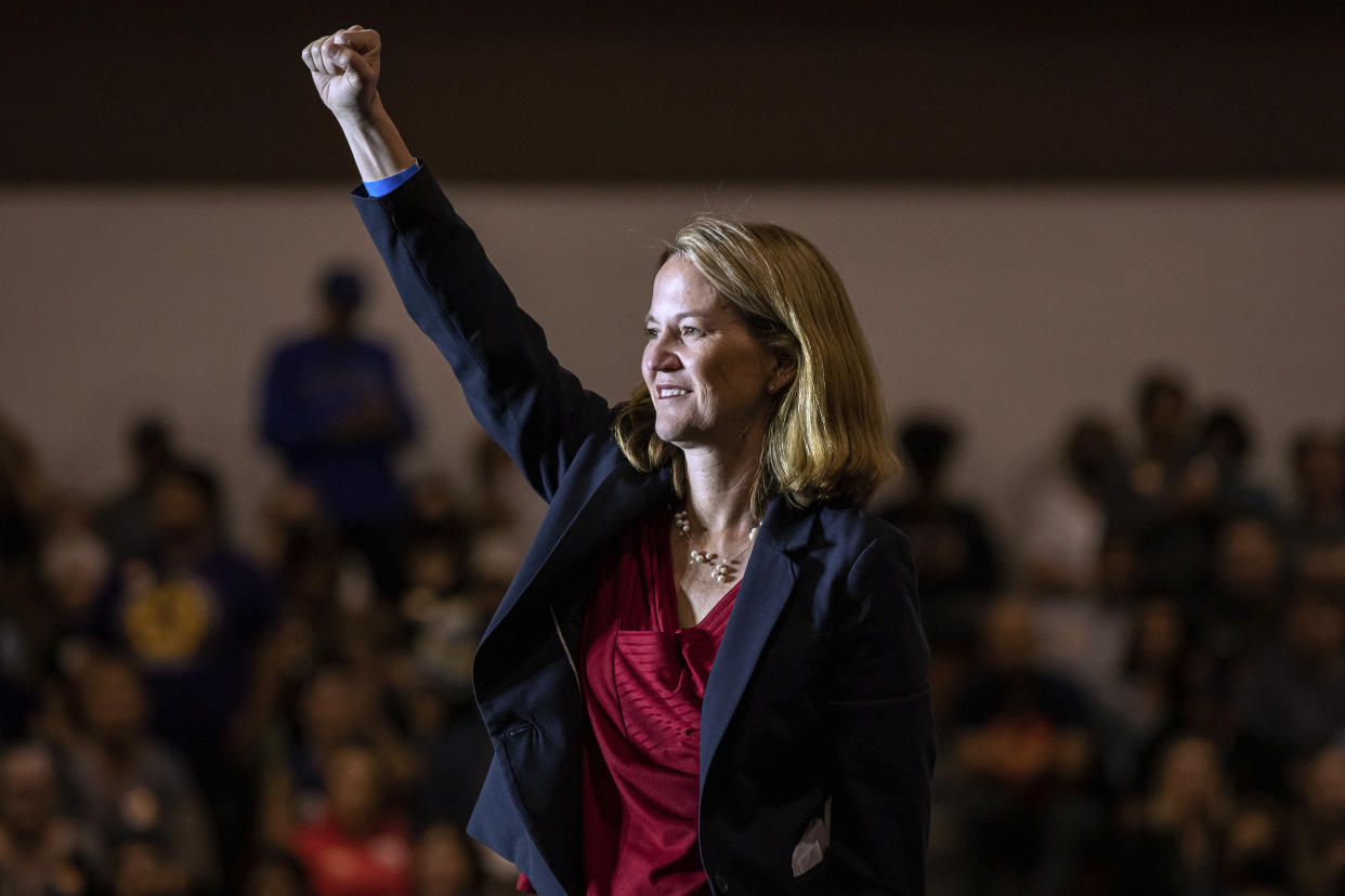 Kris Mayes, a candidate for state attorney genaeral, speaks at a Democratic rally in Phoenix, Wednesday, Nov. 2, 2022. (AP Photo/Alberto Mariani)