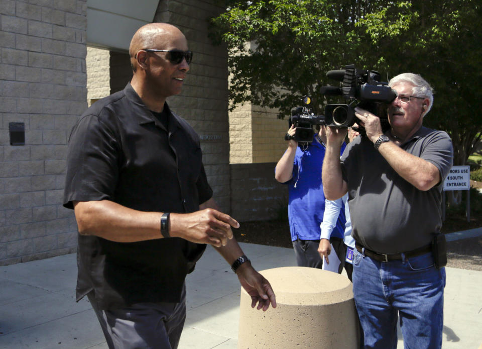 Former NFL football player Kellen Winslow, left, leaves an arraignment for his son, former NFL football player Kellen Winslow Jr., Friday, June 15, 2018, in Vista, Calif. Winslow Jr., a former tight end, was arrested Thursday on charges of rape and other sex crimes, the day he was to appear in court on an unrelated burglary charge. (AP Photo/Gregory Bull)