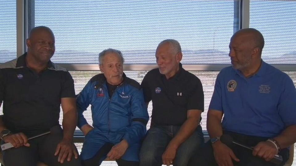 PHOTO: 90-year-old Ed Dwight, second from left, meets retired NASA astronauts Leland Melvin, Charles Bolden Jr. after his historic space flight on May 19, 2024.  and talking to Bernard Harris.  (ABC News)