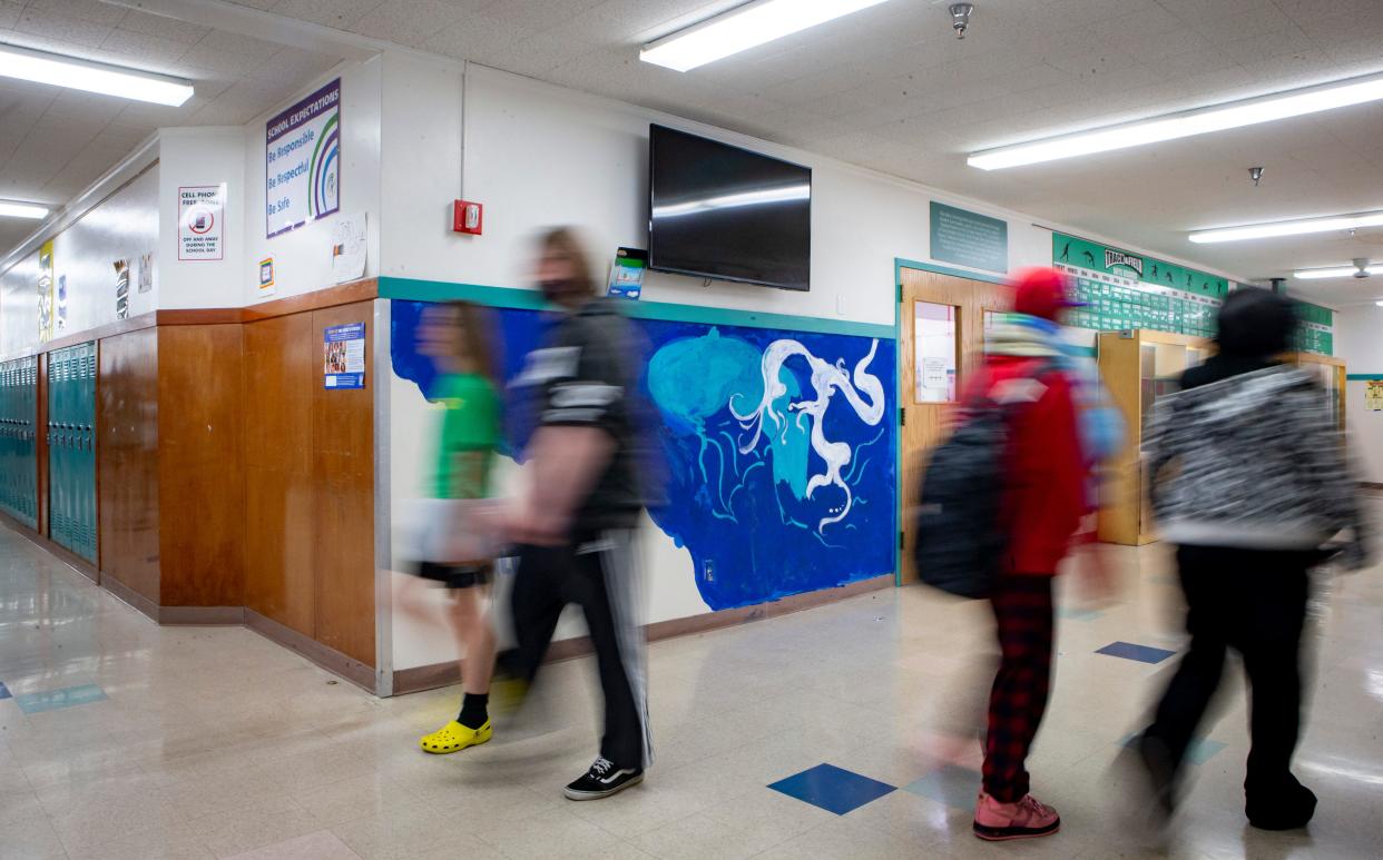 Students pass between classes at Kelly Middle School Tuesday, June 6, 2023, in Eugene. 