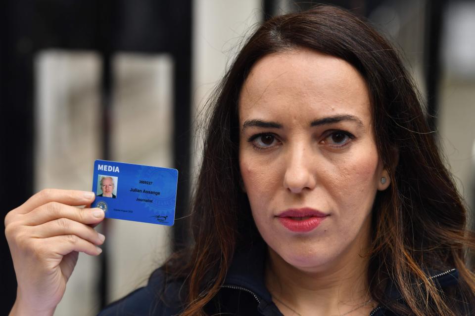 Image: Stella Moris, partner of WikiLeaks founder Julian Assange, poses holding a media card of Julian Assange as she attempts to deliver a petition and a Reporters Without Borders letter on press freedom to Downing Street in central London (Glyn Kirk / AFP - Getty Images)