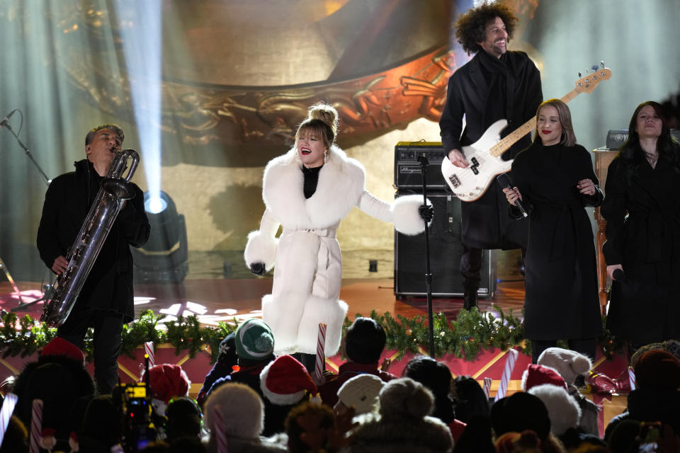 Kelly Clarkson performs before the lighting of a Christmas tree at Rockefeller Center in New York, Wednesday, Nov. 29, 2023. (AP Photo/Seth Wenig)