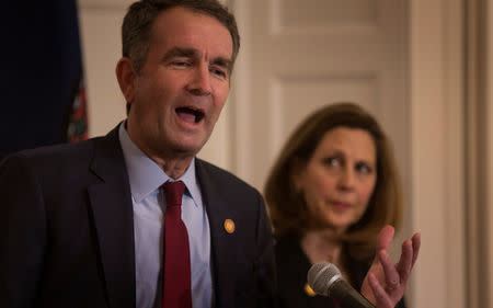 Virginia Governor Ralph Northam, accompanied by his wife Pamela Northam announces he will not resign during a news conference Richmond, Virginia, U.S. February 2, 2019. REUTERS/ Jay Paul