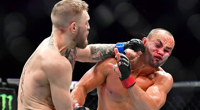 McGregor defeated Eddie Alvarez on Sunday at Maddison Square Garden to become the first UFC fighter to hold two belts simultaneously. Photo: Getty