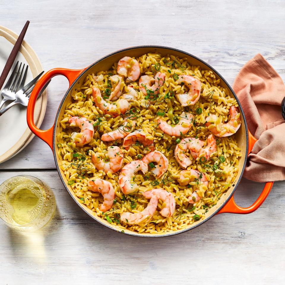 <p><strong>Recipe: <a href="https://www.southernliving.com/recipes/skillet-shrimp-destin-orzo" rel="nofollow noopener" target="_blank" data-ylk="slk:Skillet Shrimp Destin with Orzo;elm:context_link;itc:0;sec:content-canvas" class="link ">Skillet Shrimp Destin with Orzo</a></strong></p> <p>Fresh shrimp is a real treat on beach trips, and this one-dish meal is a beautiful way to enjoy it.</p>