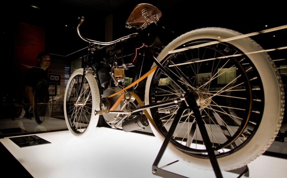 Serial Number One, a pedal bike with a small engine, built around 1903 inside a 10-by-15-foot wooden shed that had the words "Harley-Davidson Motor Company" scrawled on the door is seen during a preview of the Harley Davidson museum Monday, July 7, 2008, in Milwaukee. (AP Photo/Morry Gash)