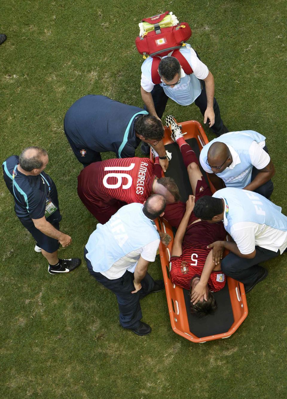 Portugal's Fabio Coentrao pulled up suddenly during the Group G match against Germany on June 16, 2014. Coentrao was diagnosed with a "second grade tear of the adductor longus muscle in the right thigh" and was <a href="https://sports.yahoo.com/news/injured-coentrao-world-cup-184919382--sow.html" data-ylk="slk:ruled out of further World Cup play;elm:context_link;itc:0;sec:content-canvas;outcm:mb_qualified_link;_E:mb_qualified_link;ct:story;" class="link  yahoo-link">ruled out of further World Cup play</a>. (Francois Marit/Pool/Reuters)