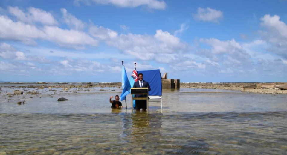 Tuvalu Foreign Minister Simon Kofe addressed the COP26 climate talks up to his knees in water. Source: Ministry of Justice, Communication and Foreign Affairs Tuvalu Government